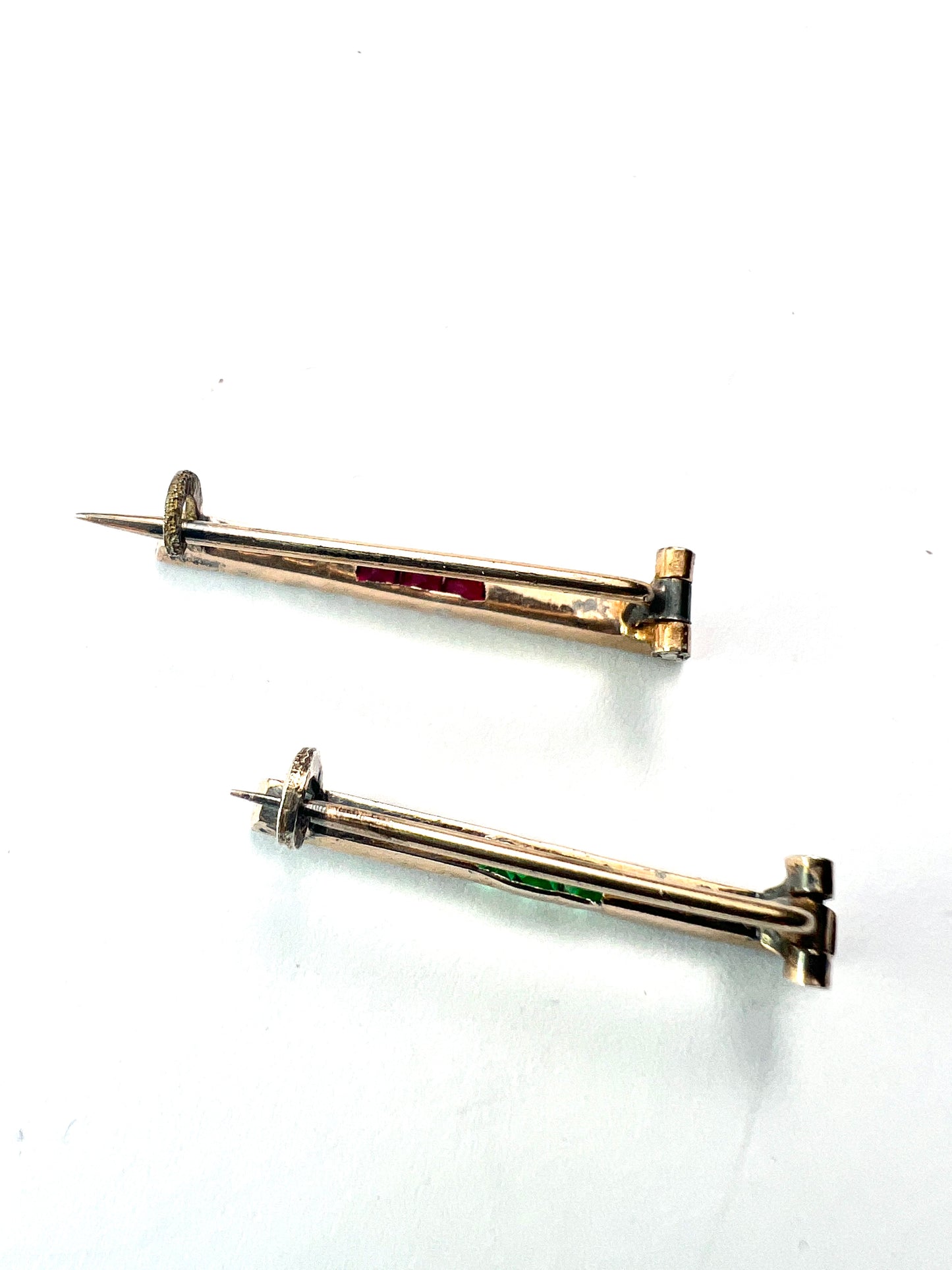 Pair of Small Art Deco Ruby and Emerald Paste Brooches